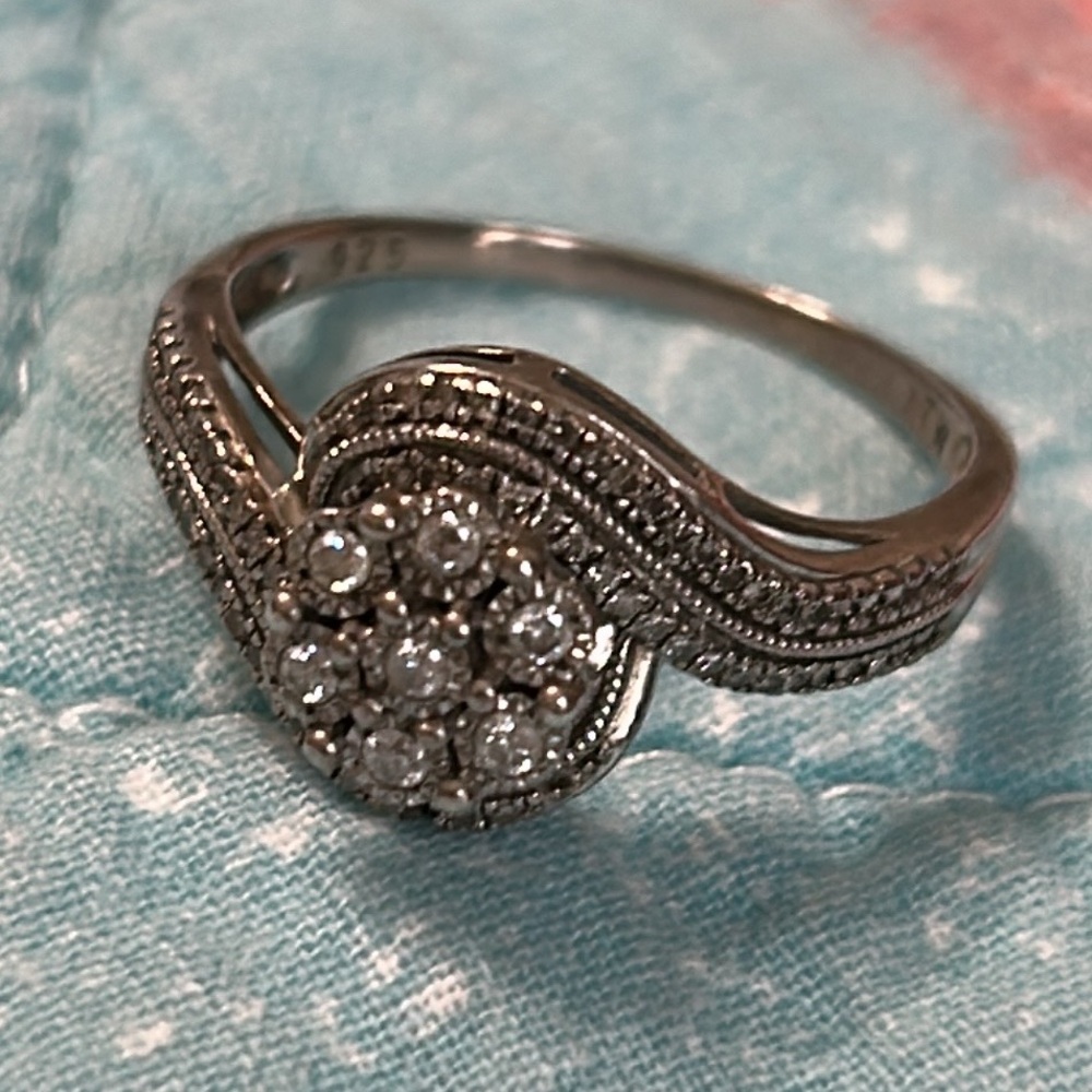 FOREVER BRIDE STERLING SILVER AND DIAMOND RING.